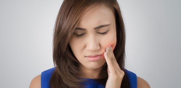Bấm huyệt thái khê để điều trị đau răng Bấm huyệt thái khê để điều trị đau răng